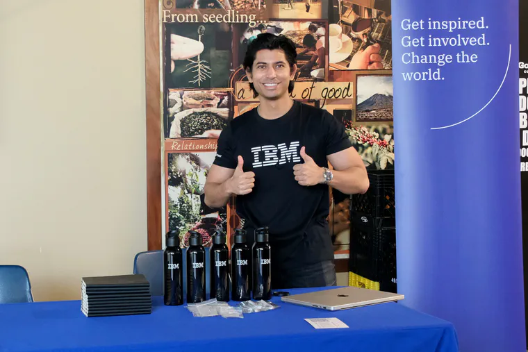 Shad at the IBM booth handing out merch!